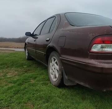 Червоний Ніссан Максіма, об'ємом двигуна 2 л та пробігом 390 тис. км за 2500 $, фото 1 на Automoto.ua