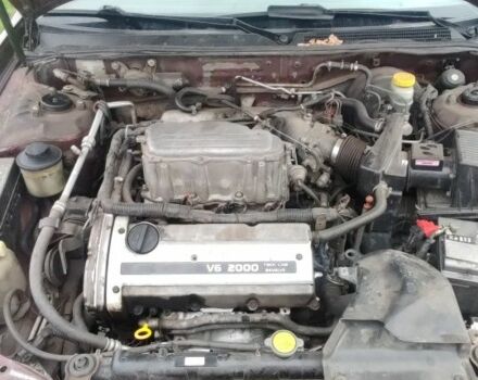 Червоний Ніссан Максіма, об'ємом двигуна 2 л та пробігом 390 тис. км за 2500 $, фото 16 на Automoto.ua