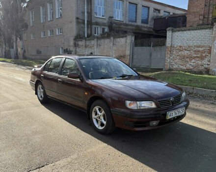 Красный Ниссан Максима, объемом двигателя 2 л и пробегом 284 тыс. км за 1800 $, фото 1 на Automoto.ua