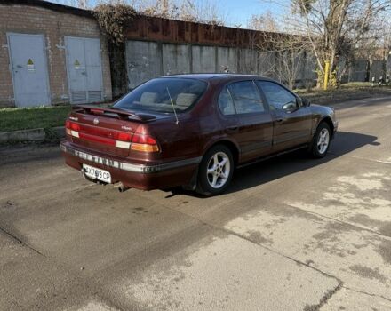 Червоний Ніссан Максіма, об'ємом двигуна 2 л та пробігом 283 тис. км за 1800 $, фото 2 на Automoto.ua