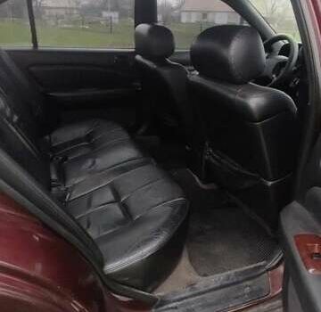 Червоний Ніссан Максіма, об'ємом двигуна 2 л та пробігом 390 тис. км за 2500 $, фото 6 на Automoto.ua