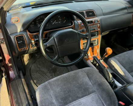 Красный Ниссан Максима, объемом двигателя 2 л и пробегом 284 тыс. км за 1800 $, фото 4 на Automoto.ua