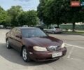 Красный Ниссан Максима, объемом двигателя 2 л и пробегом 200 тыс. км за 2000 $, фото 1 на Automoto.ua