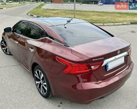 Красный Ниссан Максима, объемом двигателя 3.5 л и пробегом 190 тыс. км за 14900 $, фото 1 на Automoto.ua