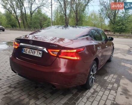 Красный Ниссан Максима, объемом двигателя 3.5 л и пробегом 190 тыс. км за 14900 $, фото 6 на Automoto.ua