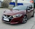 Красный Ниссан Максима, объемом двигателя 3.5 л и пробегом 169 тыс. км за 14900 $, фото 1 на Automoto.ua