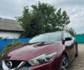 Красный Ниссан Максима, объемом двигателя 3.5 л и пробегом 107 тыс. км за 16600 $, фото 2 на Automoto.ua