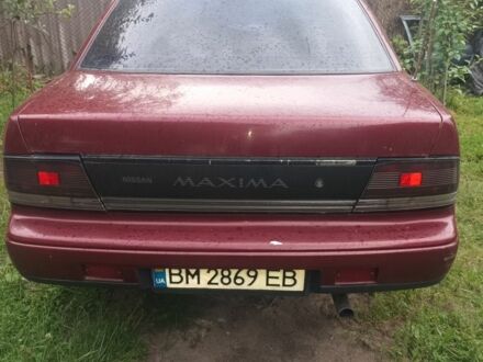 Красный Ниссан Максима, объемом двигателя 3 л и пробегом 222 тыс. км за 1077 $, фото 1 на Automoto.ua