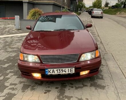 Красный Ниссан Максима, объемом двигателя 2.99 л и пробегом 300 тыс. км за 1850 $, фото 1 на Automoto.ua