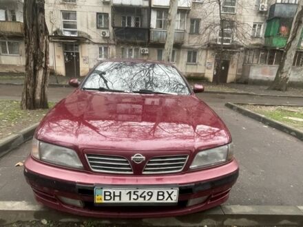 Червоний Ніссан Максіма, об'ємом двигуна 3 л та пробігом 378 тис. км за 1650 $, фото 1 на Automoto.ua