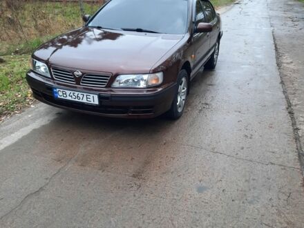 Красный Ниссан Максима, объемом двигателя 2 л и пробегом 450 тыс. км за 3400 $, фото 1 на Automoto.ua