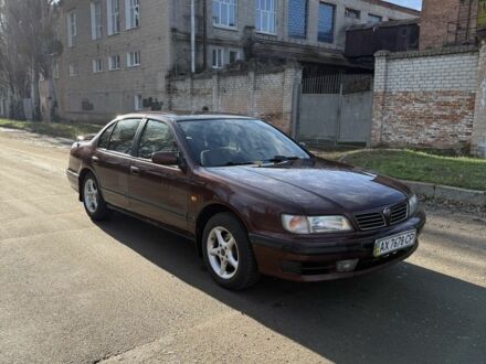 Красный Ниссан Максима, объемом двигателя 2 л и пробегом 283 тыс. км за 1800 $, фото 1 на Automoto.ua