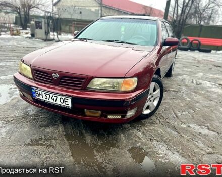 Красный Ниссан Максима, объемом двигателя 2 л и пробегом 200 тыс. км за 2200 $, фото 1 на Automoto.ua