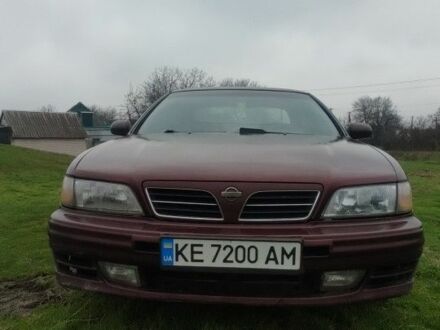 Красный Ниссан Максима, объемом двигателя 2 л и пробегом 390 тыс. км за 2500 $, фото 1 на Automoto.ua