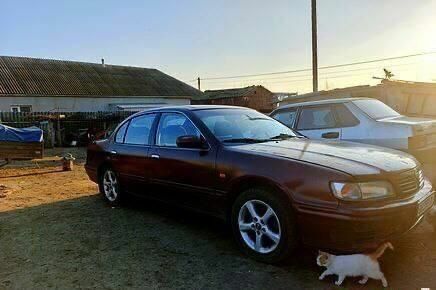 Красный Ниссан Максима, объемом двигателя 2 л и пробегом 490 тыс. км за 1300 $, фото 1 на Automoto.ua