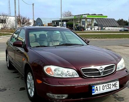Красный Ниссан Максима, объемом двигателя 2 л и пробегом 250 тыс. км за 2500 $, фото 1 на Automoto.ua