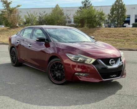 Червоний Ніссан Максіма, об'ємом двигуна 3.5 л та пробігом 75 тис. км за 12000 $, фото 1 на Automoto.ua