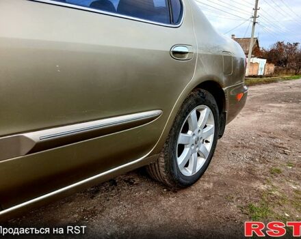 Жовтий Ніссан Максіма, об'ємом двигуна 2 л та пробігом 305 тис. км за 5100 $, фото 5 на Automoto.ua