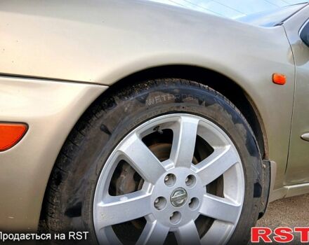 Жовтий Ніссан Максіма, об'ємом двигуна 2 л та пробігом 305 тис. км за 5100 $, фото 3 на Automoto.ua