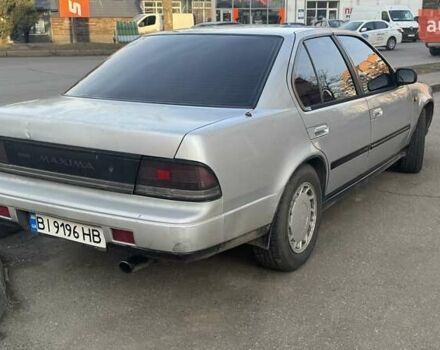 Серый Ниссан Максима, объемом двигателя 2.96 л и пробегом 380 тыс. км за 1850 $, фото 2 на Automoto.ua