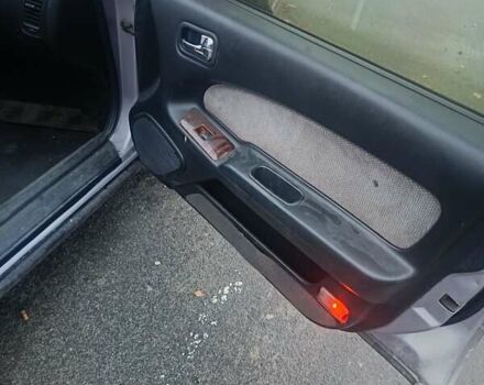 Серый Ниссан Максима, объемом двигателя 2 л и пробегом 284 тыс. км за 1000 $, фото 7 на Automoto.ua