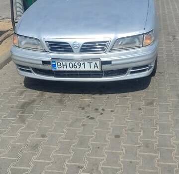 Серый Ниссан Максима, объемом двигателя 2 л и пробегом 202 тыс. км за 2100 $, фото 2 на Automoto.ua