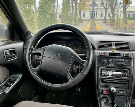 Сірий Ніссан Максіма, об'ємом двигуна 2 л та пробігом 480 тис. км за 1450 $, фото 5 на Automoto.ua
