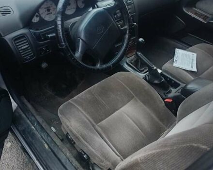 Серый Ниссан Максима, объемом двигателя 2 л и пробегом 284 тыс. км за 1000 $, фото 6 на Automoto.ua