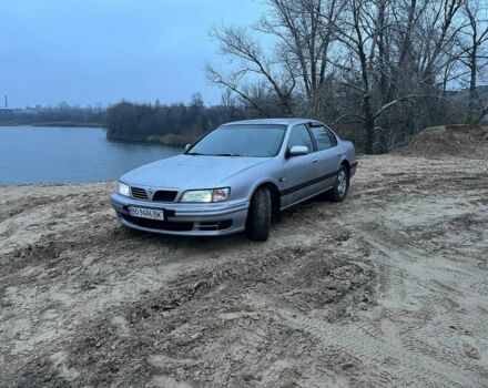 Серый Ниссан Максима, объемом двигателя 3 л и пробегом 123 тыс. км за 1100 $, фото 1 на Automoto.ua