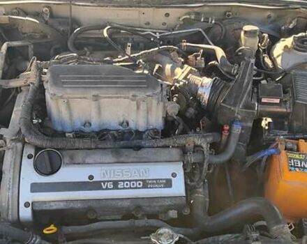 Серый Ниссан Максима, объемом двигателя 2 л и пробегом 400 тыс. км за 2800 $, фото 2 на Automoto.ua