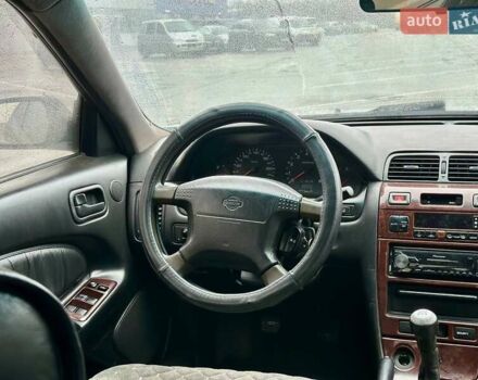 Серый Ниссан Максима, объемом двигателя 2 л и пробегом 300 тыс. км за 2500 $, фото 7 на Automoto.ua