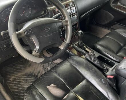 Сірий Ніссан Максіма, об'ємом двигуна 3 л та пробігом 350 тис. км за 1999 $, фото 2 на Automoto.ua