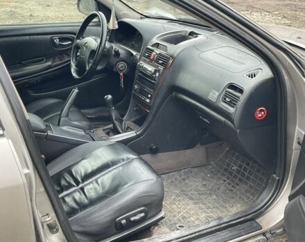 Серый Ниссан Максима, объемом двигателя 2 л и пробегом 300 тыс. км за 1850 $, фото 11 на Automoto.ua