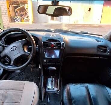 Серый Ниссан Максима, объемом двигателя 2 л и пробегом 320 тыс. км за 3000 $, фото 3 на Automoto.ua