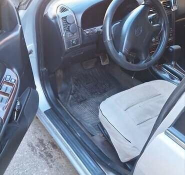 Серый Ниссан Максима, объемом двигателя 2 л и пробегом 320 тыс. км за 3000 $, фото 2 на Automoto.ua