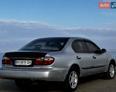 Серый Ниссан Максима, объемом двигателя 3 л и пробегом 390 тыс. км за 2000 $, фото 5 на Automoto.ua