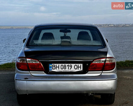 Серый Ниссан Максима, объемом двигателя 3 л и пробегом 390 тыс. км за 2000 $, фото 4 на Automoto.ua