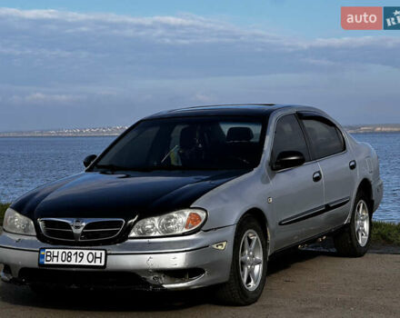 Серый Ниссан Максима, объемом двигателя 3 л и пробегом 390 тыс. км за 2000 $, фото 2 на Automoto.ua