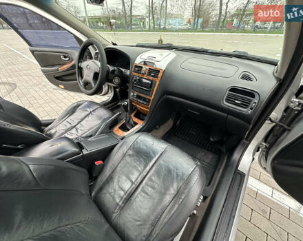 Серый Ниссан Максима, объемом двигателя 2 л и пробегом 286 тыс. км за 4999 $, фото 46 на Automoto.ua