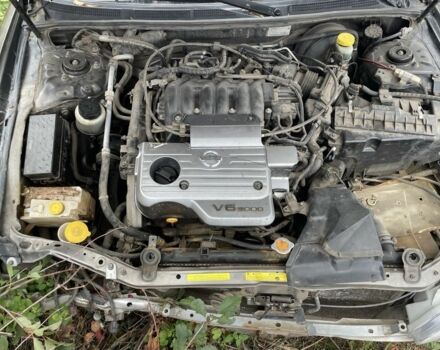 Серый Ниссан Максима, объемом двигателя 0 л и пробегом 450 тыс. км за 950 $, фото 1 на Automoto.ua