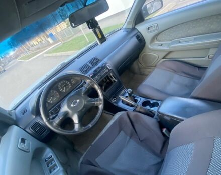 Серый Ниссан Максима, объемом двигателя 2 л и пробегом 250 тыс. км за 799 $, фото 1 на Automoto.ua
