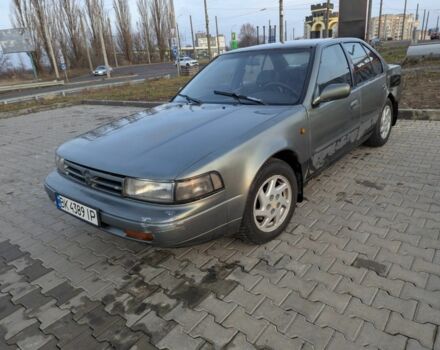 Серый Ниссан Максима, объемом двигателя 3 л и пробегом 450 тыс. км за 600 $, фото 1 на Automoto.ua