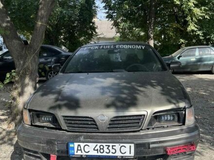 Сірий Ніссан Максіма, об'ємом двигуна 3 л та пробігом 350 тис. км за 1999 $, фото 1 на Automoto.ua