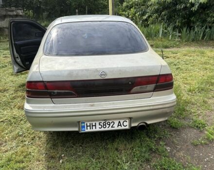 Серый Ниссан Максима, объемом двигателя 2 л и пробегом 350 тыс. км за 2508 $, фото 1 на Automoto.ua