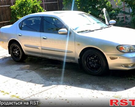 Серый Ниссан Максима, объемом двигателя 3 л и пробегом 380 тыс. км за 2000 $, фото 1 на Automoto.ua