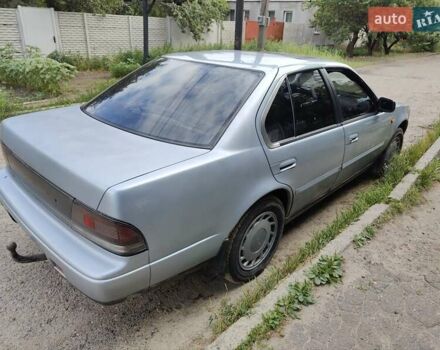 Синий Ниссан Максима, объемом двигателя 3 л и пробегом 302 тыс. км за 1200 $, фото 4 на Automoto.ua