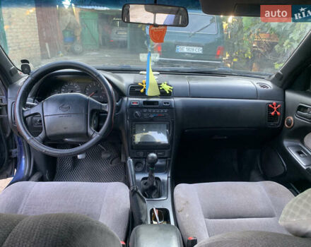 Синий Ниссан Максима, объемом двигателя 2 л и пробегом 302 тыс. км за 2300 $, фото 7 на Automoto.ua