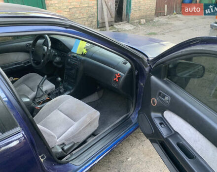 Синий Ниссан Максима, объемом двигателя 2 л и пробегом 302 тыс. км за 2300 $, фото 5 на Automoto.ua