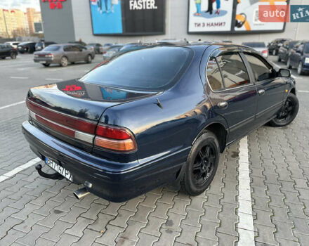 Синий Ниссан Максима, объемом двигателя 3 л и пробегом 290 тыс. км за 1950 $, фото 4 на Automoto.ua