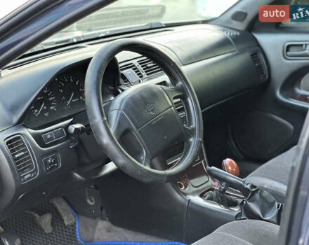 Синий Ниссан Максима, объемом двигателя 3 л и пробегом 290 тыс. км за 1950 $, фото 6 на Automoto.ua